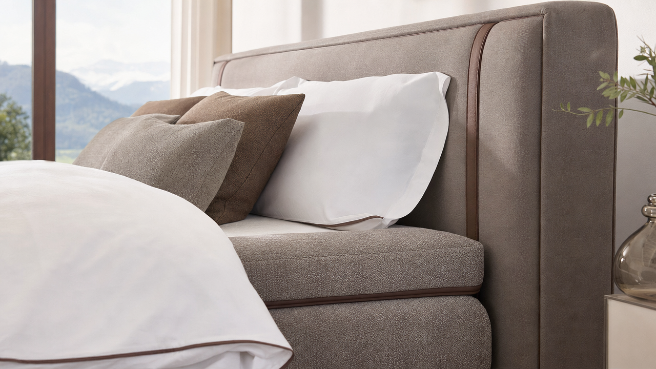 Detailaufnahme eines Luxus-Boxspringbetts mit hochwertigem Polsterstoff — beste Luxus Boxspringbetten Schweiz im Detail